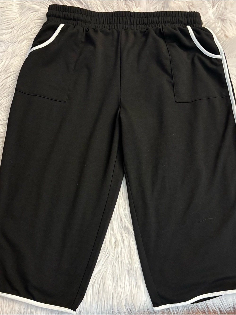 Two pairs of size xl or 14/16 capris